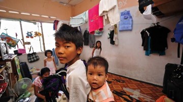 A family of Chin refugees from Burma lives in a cramped flat in Kuala Lumpur, trying to eke out a living while keeping under the official radar. Picture: John Ishii Source: The Australian