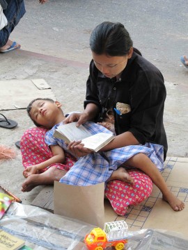 A moment of reading in Myanmar. Photo Sian Powell