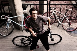 Shannon Bufton, with his bike in Beijing.